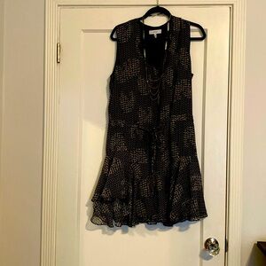 Little black dress upgraded with subtle pattern from office to happy hour